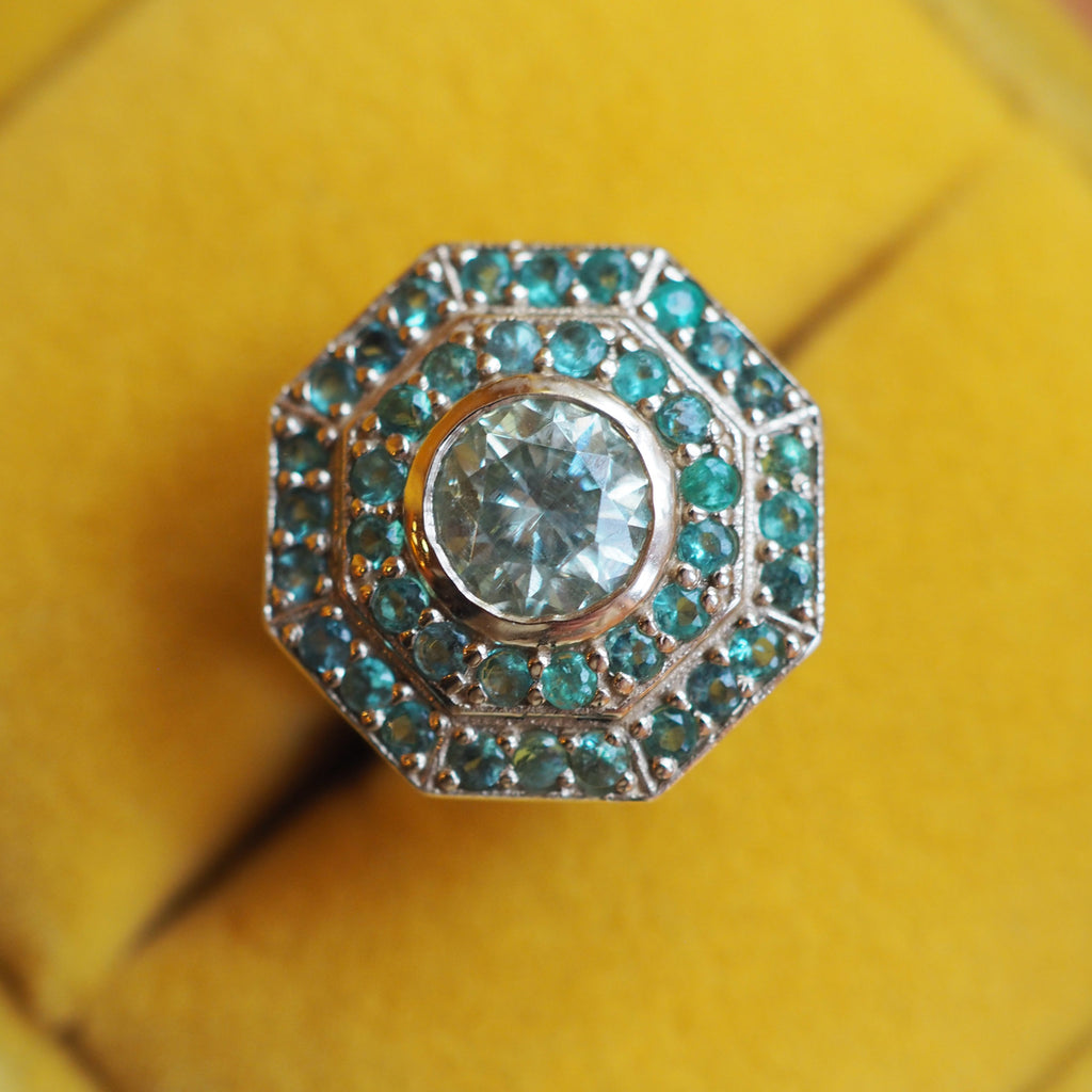 1.5ct Teal Moissanite & Emerald Target Ring