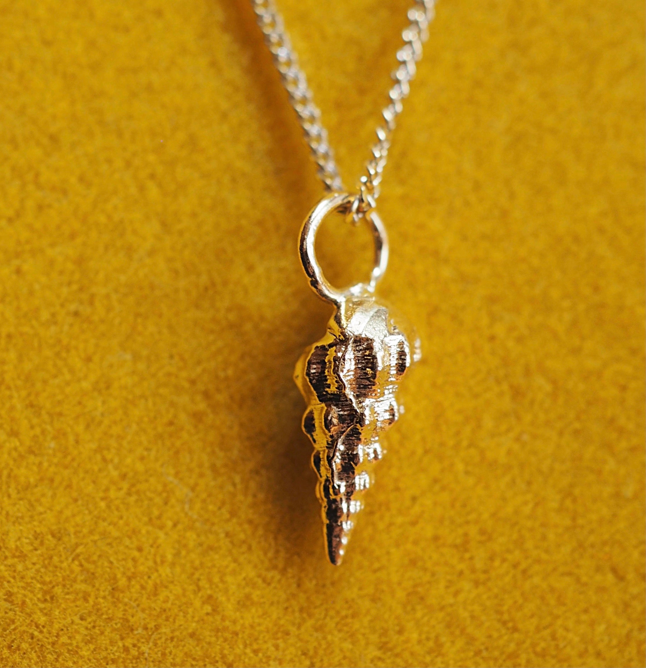 Spiral hotsell shell pendant